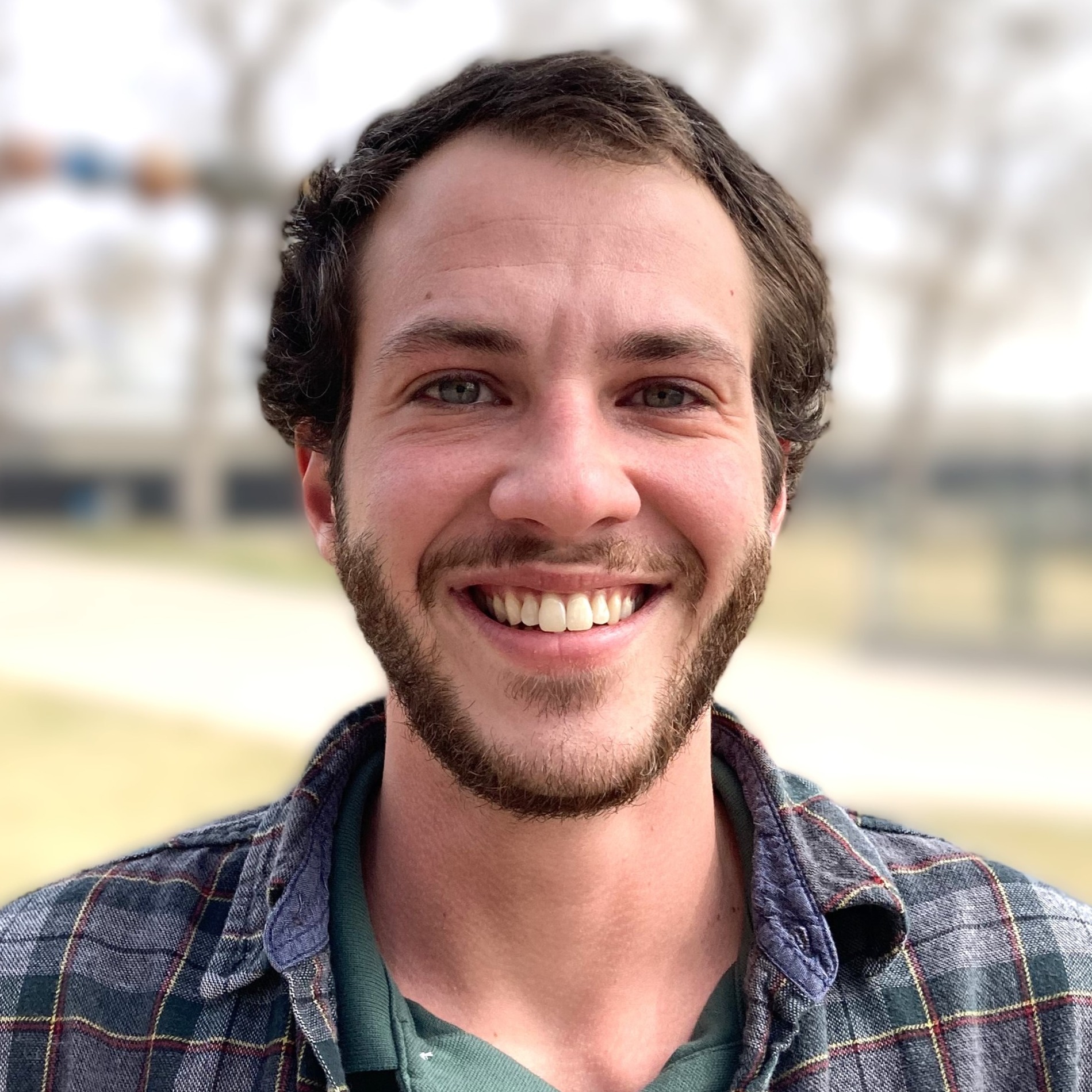 Elijah outdoors smiling